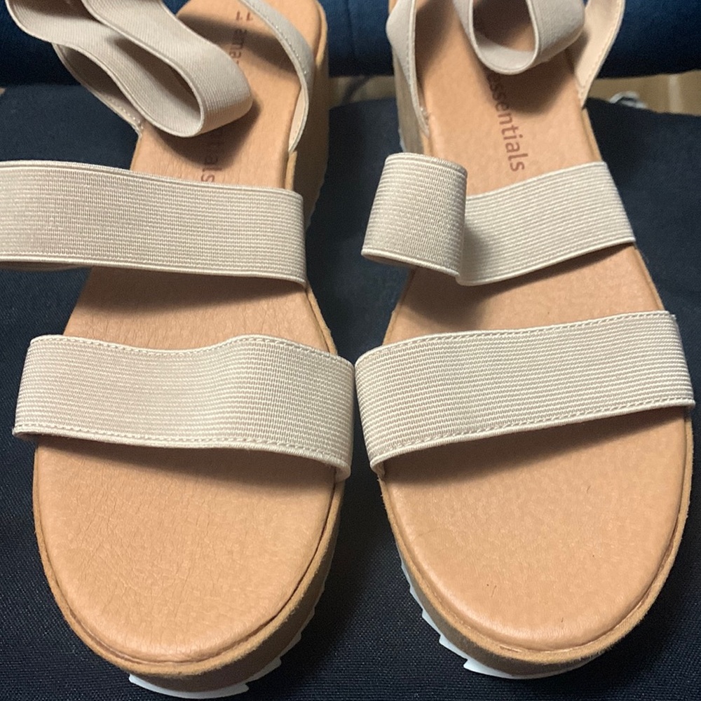 Strappy platform heel sandals.